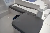 Leopard 48 yacht seating area with gray cushions, 2018 model.