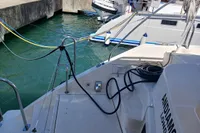 2018 Leopard 48 yacht docked, showing deck and mooring lines.