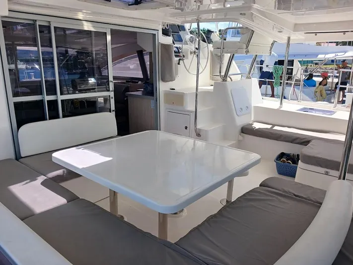 Andiamo IV Yacht Photos Pics Luxurious 2018 Leopard 48 yacht interior with spacious seating and modern design.