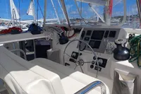 Cockpit of 2018 Leopard 48 yacht with steering wheel and navigation instruments.