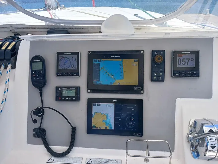 Andiamo IV Yacht Photos Pics Control panel of a 2018 Leopard 48 yacht with navigation and communication instruments.