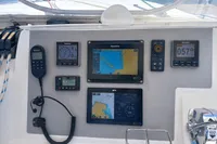 Control panel of a 2018 Leopard 48 yacht with navigation and communication instruments.