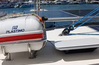 2018 Leopard 48 yacht deck with Plastimo life raft and solar panels.