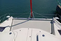 Leopard 48 catamaran deck with netting, 2018 model, docked on calm water.