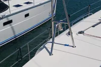 Sailing yacht deck view, Leopard 48, 2018 model, docked beside another boat.