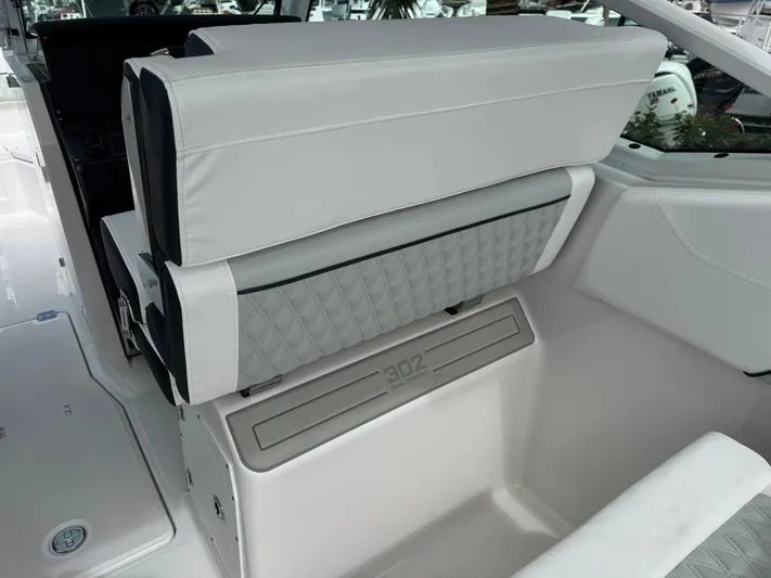  Yacht Photos Pics 2026 Blackfin 302 DC boat interior with sleek, modern seating design.