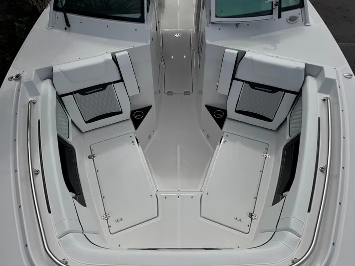  Yacht Photos Pics 2026 Blackfin 302 DC boat interior with sleek seating and storage compartments.