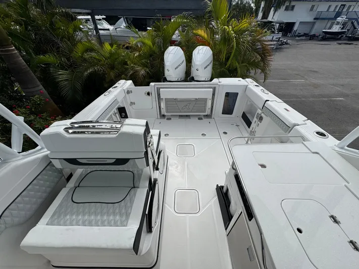  Yacht Photos Pics 2026 Blackfin 302 DC boat interior with dual engines, spacious deck, and modern seating.