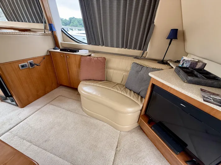  Yacht Photos Pics Luxurious interior of a 2004 Meridian 381 Sedan yacht with leather seating and modern amenities.