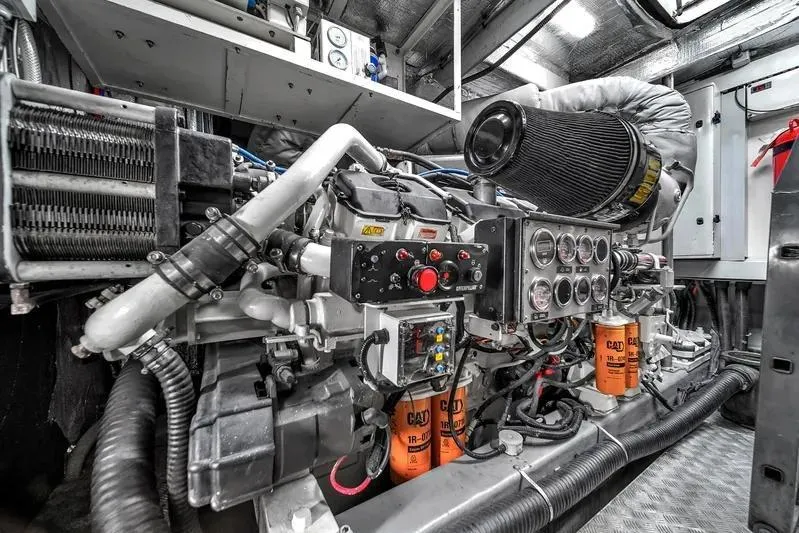  Yacht Photos Pics Engine room of 2006 Sunseeker Predator 72 yacht, showcasing complex machinery and components.