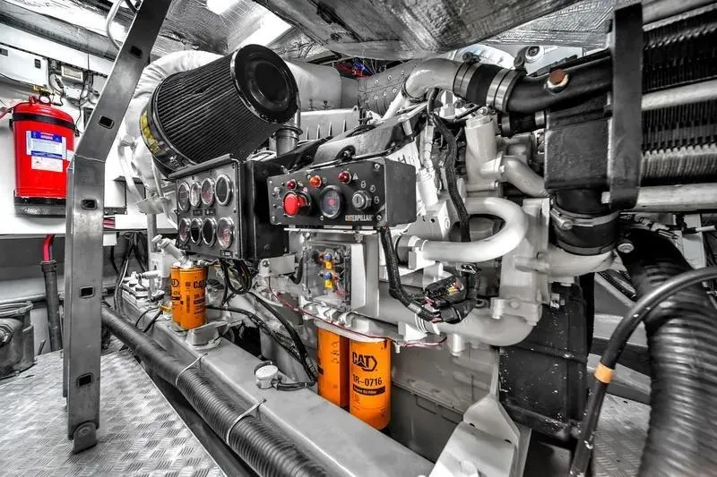  Yacht Photos Pics Engine room of 2006 Sunseeker Predator 72 yacht, featuring CAT components and control panel.