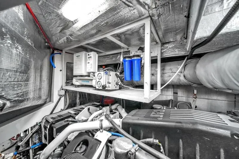  Yacht Photos Pics Engine room of 2006 Sunseeker Predator 72 yacht, featuring mechanical components and filtration system.