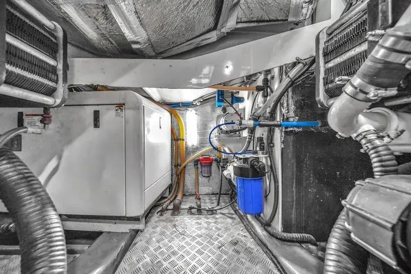  Yacht Photos Pics Engine room of 2006 Sunseeker Predator 72 yacht, featuring mechanical equipment and piping.