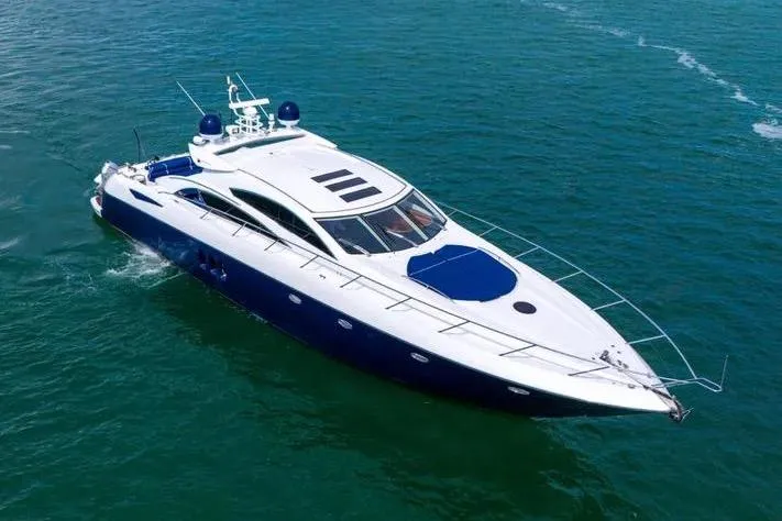  Yacht Photos Pics 2006 Sunseeker Predator 72 yacht cruising on open water.