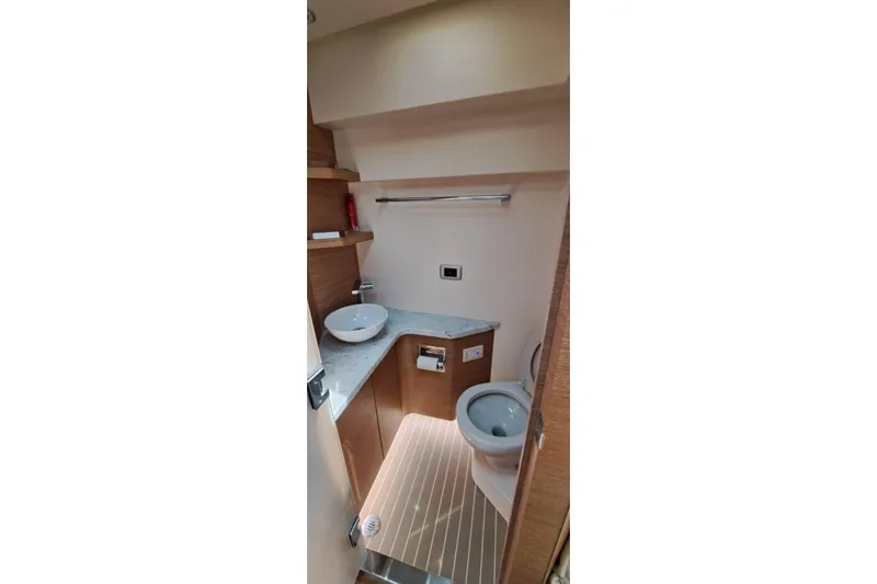 Yacht Photos Pics Luxurious bathroom interior of 2022 Scout 530 LXF boat with modern fixtures.