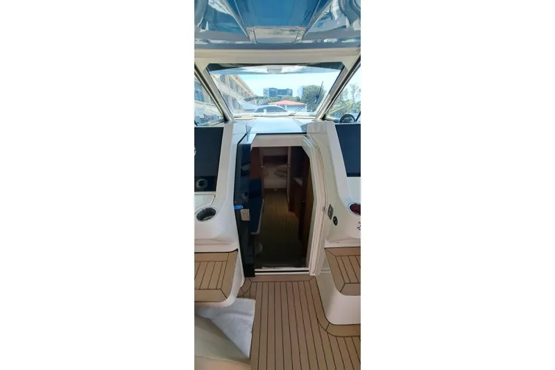  Yacht Photos Pics Interior view of 2022 Scout 530 LXF boat, showcasing cabin entrance and sleek design.