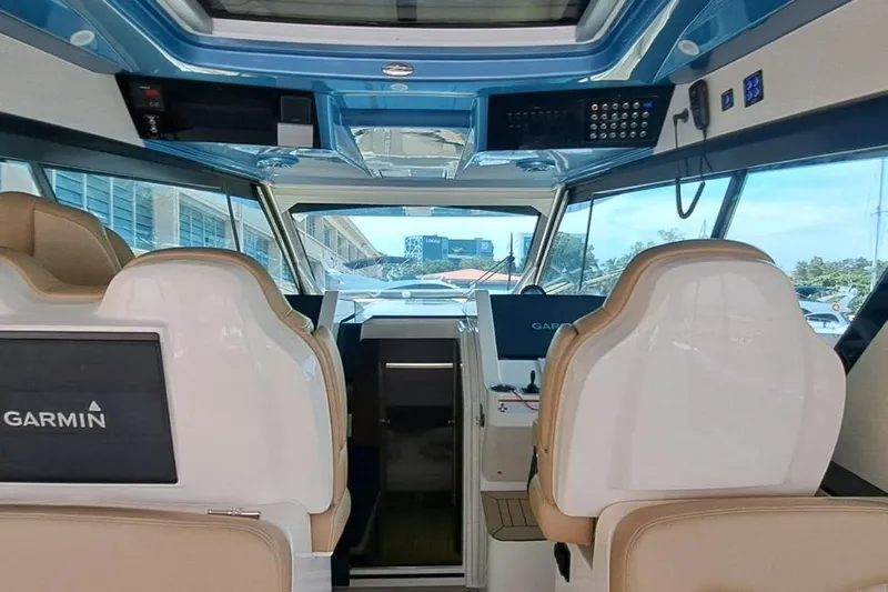  Yacht Photos Pics Interior view of 2022 Scout 530 LXF boat with Garmin navigation system.