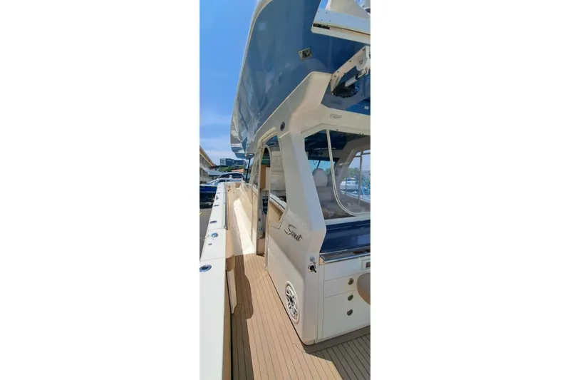  Yacht Photos Pics 2022 Scout 530 LXF luxury yacht with sleek design and spacious deck.
