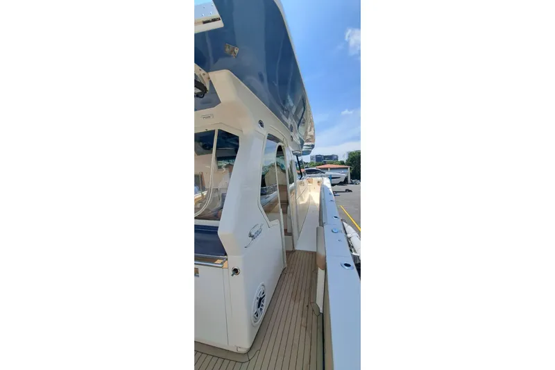  Yacht Photos Pics 2022 Scout 530 LXF yacht side view, showcasing sleek design and modern features.