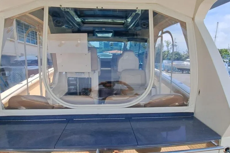  Yacht Photos Pics 2022 Scout 530 LXF yacht interior with seating and helm station.