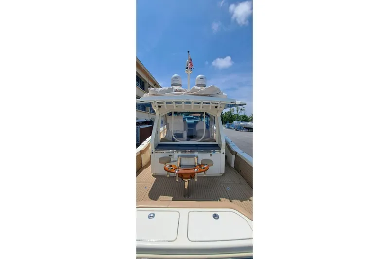  Yacht Photos Pics 2022 Scout 530 LXF luxury boat with spacious deck and modern amenities.