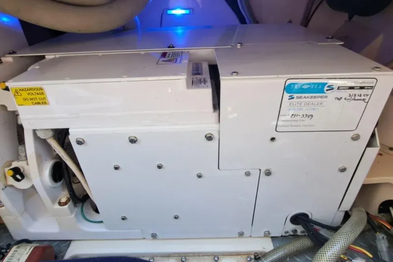  Yacht Photos Pics Seakeeper system in 2022 Scout 530 LXF boat, featuring hazard warning label.