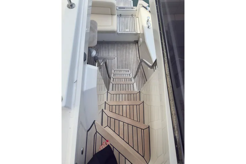Waxing Gibbous Yacht Photos Pics Staircase on 2024 Greenline 48 Fly yacht with elegant wooden finish.