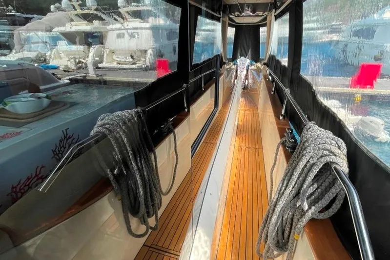  Yacht Photos Pics 2018 Absolute NAVETTA 58 yacht with teak deck and mooring ropes.