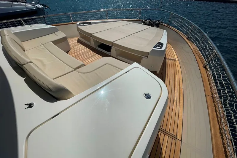  Yacht Photos Pics Luxurious deck of 2018 Absolute NAVETTA 58 yacht with elegant seating and ocean view.
