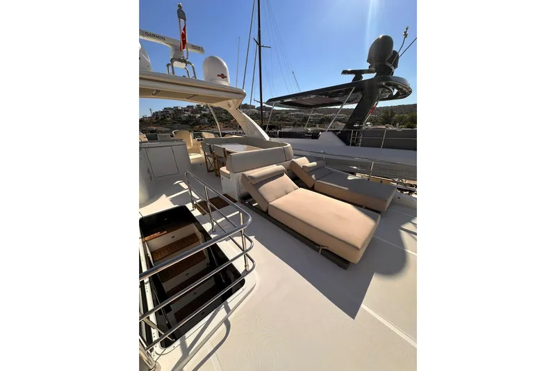  Yacht Photos Pics Luxurious 2018 Absolute NAVETTA 58 yacht deck with sun loungers and sleek design.