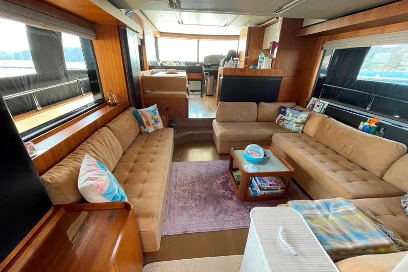  Yacht Photos Pics Luxurious interior of 2018 Absolute NAVETTA 58 yacht with plush seating and elegant decor.