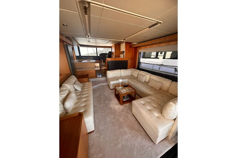  Yacht Photos Pics Luxurious interior of 2018 Absolute NAVETTA 58 yacht with plush white seating.