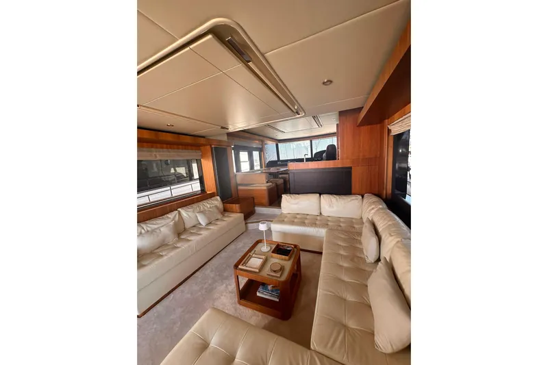  Yacht Photos Pics Luxurious interior of 2018 Absolute NAVETTA 58 yacht with plush seating and elegant decor.