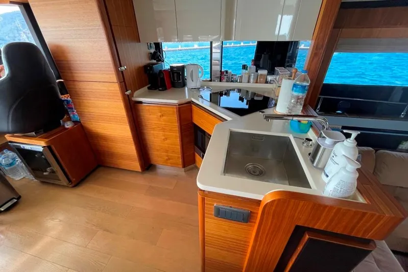  Yacht Photos Pics Luxurious kitchen area on 2018 Absolute NAVETTA 58 yacht with ocean view.