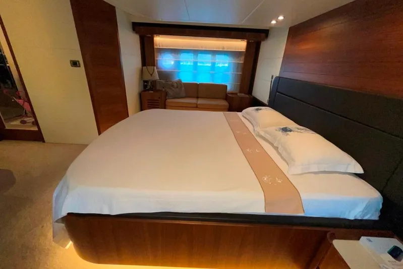  Yacht Photos Pics Luxurious bedroom interior of 2018 Absolute NAVETTA 58 yacht with elegant furnishings.
