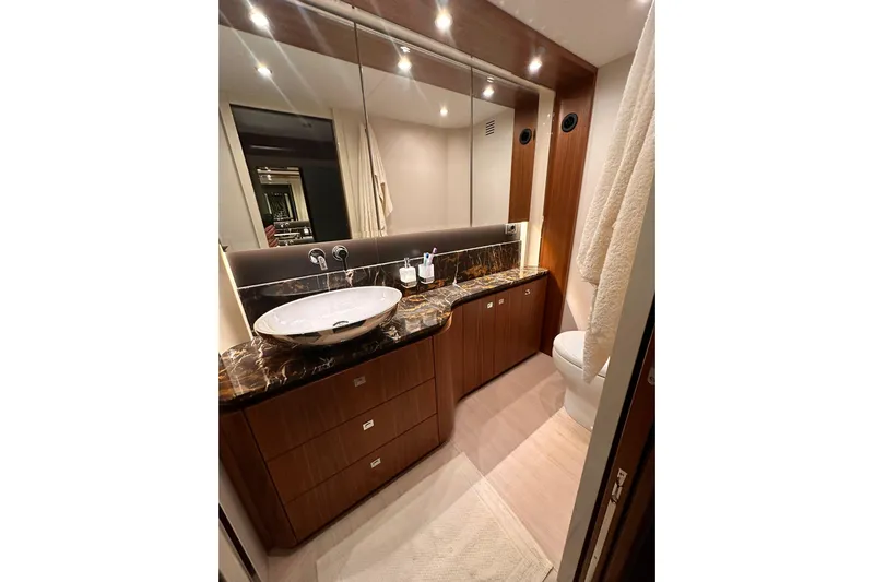 Yacht Photos Pics Luxurious bathroom in 2018 Absolute NAVETTA 58 yacht with elegant fixtures and marble countertop.