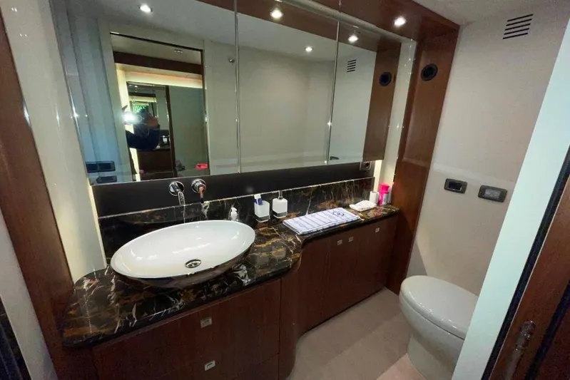  Yacht Photos Pics Luxurious bathroom in 2018 Absolute NAVETTA 58 yacht with elegant fixtures and marble countertop.