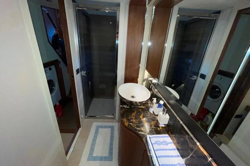  Yacht Photos Pics Luxurious bathroom in 2018 Absolute NAVETTA 58 yacht with modern fixtures and elegant design.