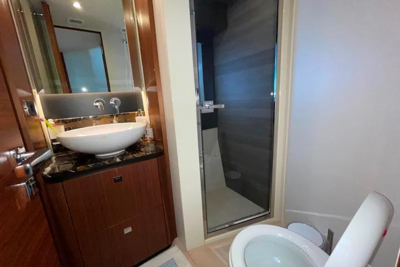  Yacht Photos Pics Luxurious bathroom on 2018 Absolute NAVETTA 58 yacht with modern sink and shower.