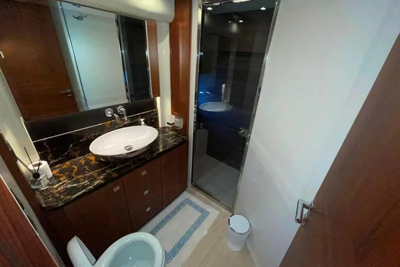  Yacht Photos Pics Luxurious bathroom in 2018 Absolute NAVETTA 58 yacht with marble countertop and modern fixtures.