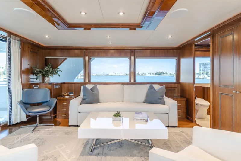 White Lotus Yacht Photos Pics Luxurious 2011 President Sterling Tri-Deck yacht interior with elegant seating and ocean views.
