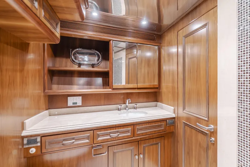 White Lotus Yacht Photos Pics Luxurious wooden bathroom interior on 2011 President Sterling Tri-Deck yacht.