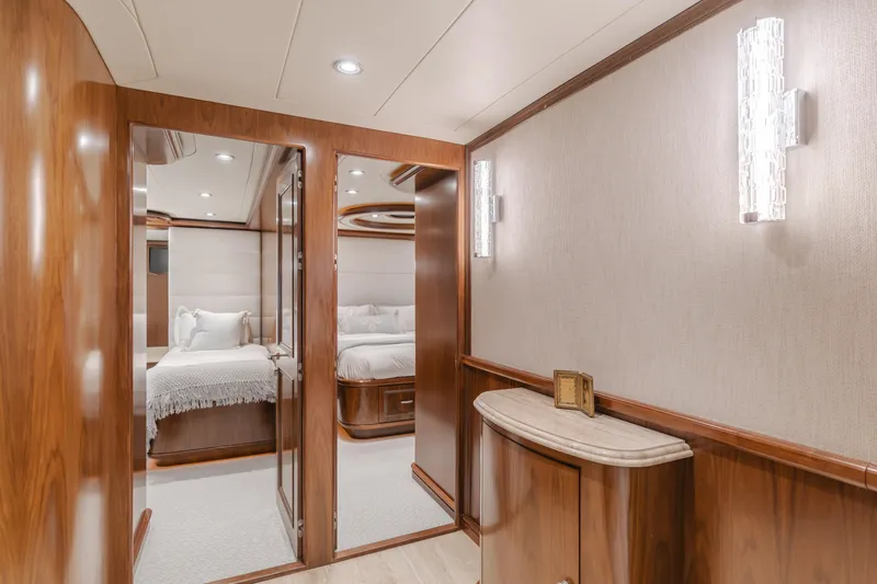 White Lotus Yacht Photos Pics Luxurious interior of 2011 President Sterling Tri-Deck yacht with elegant wood finishes.