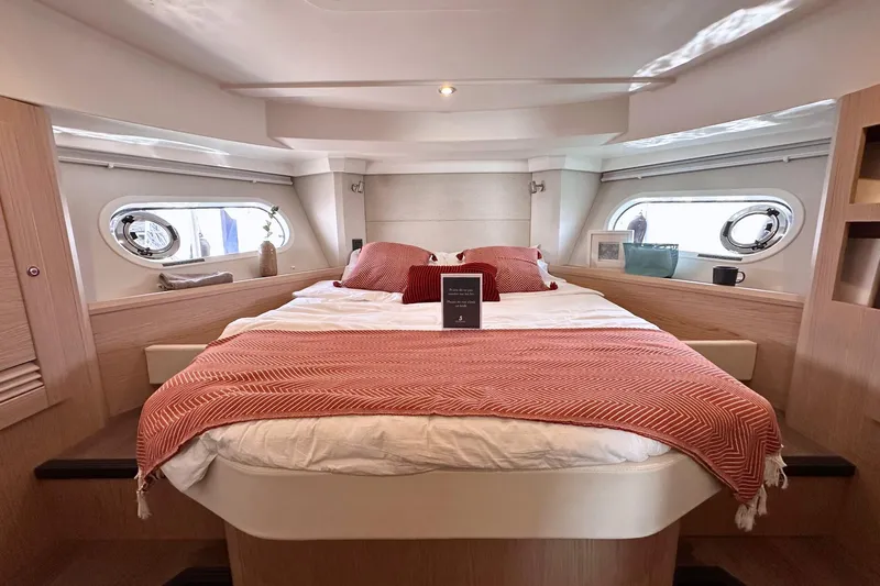  Yacht Photos Pics Luxurious bedroom interior of 2025 Beneteau Swift Trawler 41 Fly yacht.