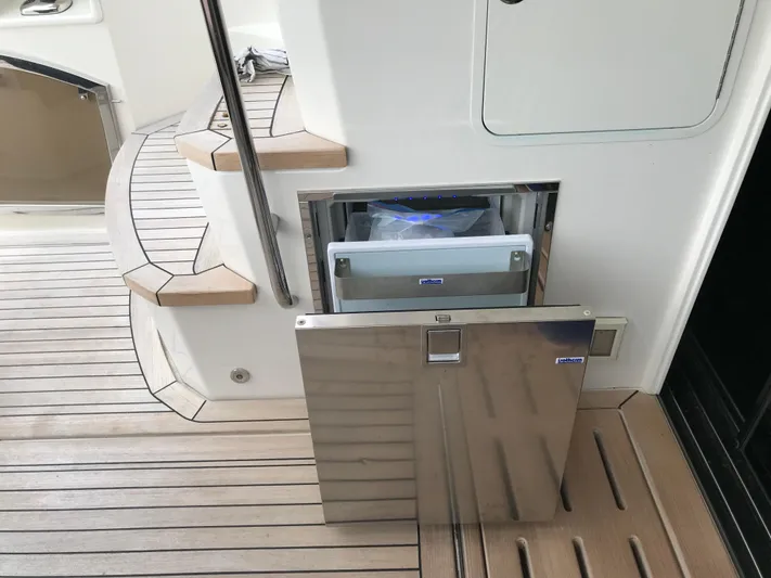 Forevermore Yacht Photos Pics Stainless steel drawer on 2016 Sea Ray L590 Fly yacht with wooden deck.