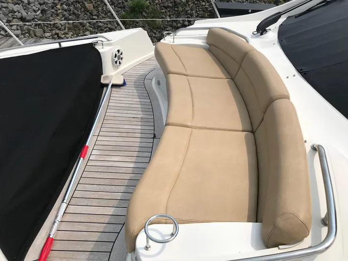 Forevermore Yacht Photos Pics Luxurious seating on 2016 Sea Ray L590 Fly yacht deck.