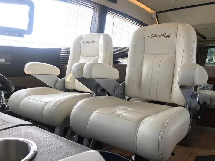 Forevermore Yacht Photos Pics Luxurious leather seats in 2016 Sea Ray L590 Fly yacht interior.
