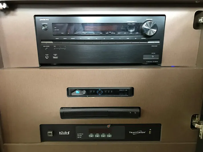 Forevermore Yacht Photos Pics Entertainment system controls on a 2016 Sea Ray L590 Fly yacht.