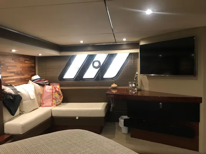 Forevermore Yacht Photos Pics Luxurious interior of 2016 Sea Ray L590 Fly yacht with cozy seating and modern amenities.
