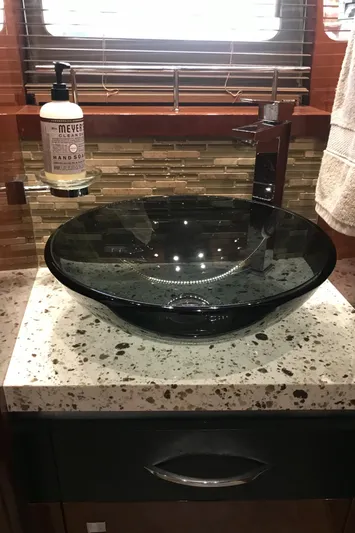Forevermore Yacht Photos Pics Modern glass sink in 2016 Sea Ray L590 Fly yacht bathroom.
